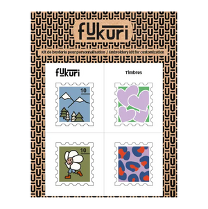 20051-Broderie-Fukuri-planche-a-broder-Timbres-montagne-fleur-coeurs-leopard