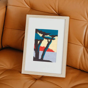 kit canevas fukuri motif paysage bord de mer sur canapé cuir marron