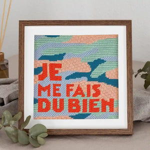Simulation d'encadrement pour le kit canevas Je me fais du bien réalisé avec des points de canevas fantaisie