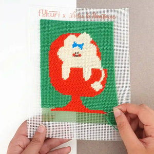 Réalisation du kit canevas Chien bichon au motif illustré par Lulu La Nantaise