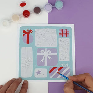 réalisation en cours du kit de peinture au numéro Fukuri motif cadeaux de Noël