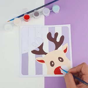 Réalisation d'une carte de peinture au numéro avec un renne de Noël
